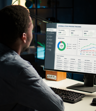 ERP Specialist monitoring performance charts on screen