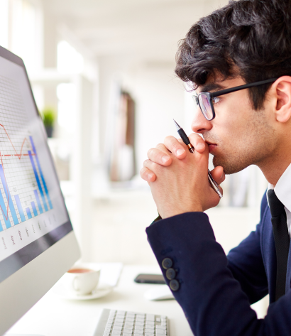 ERP expert analyzing performance charts for decision making