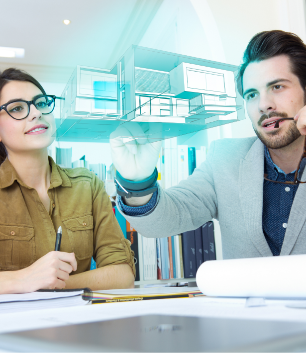 Two designers reviewing 3D wireframe prototypes